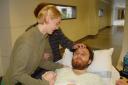 Ian getting wheeled to the O.R.