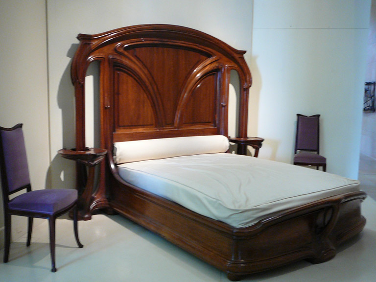 I want this bed! It looks like a tree AND it has built-in side tables!
