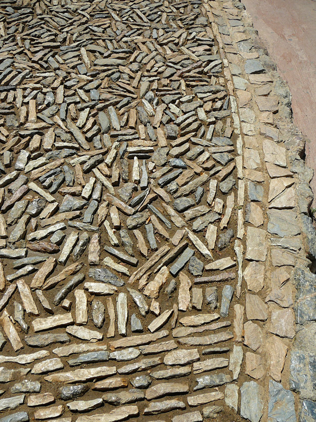 This would hurt bare feet like crazy. Looks cool, though.